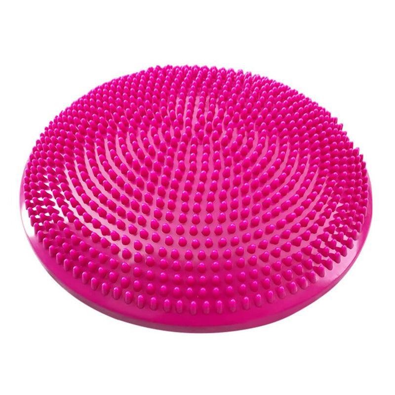 Pink textured cushion on a white background