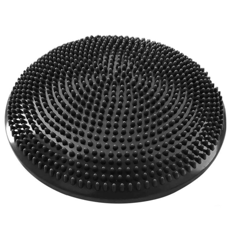 Black textured circular object on a white background