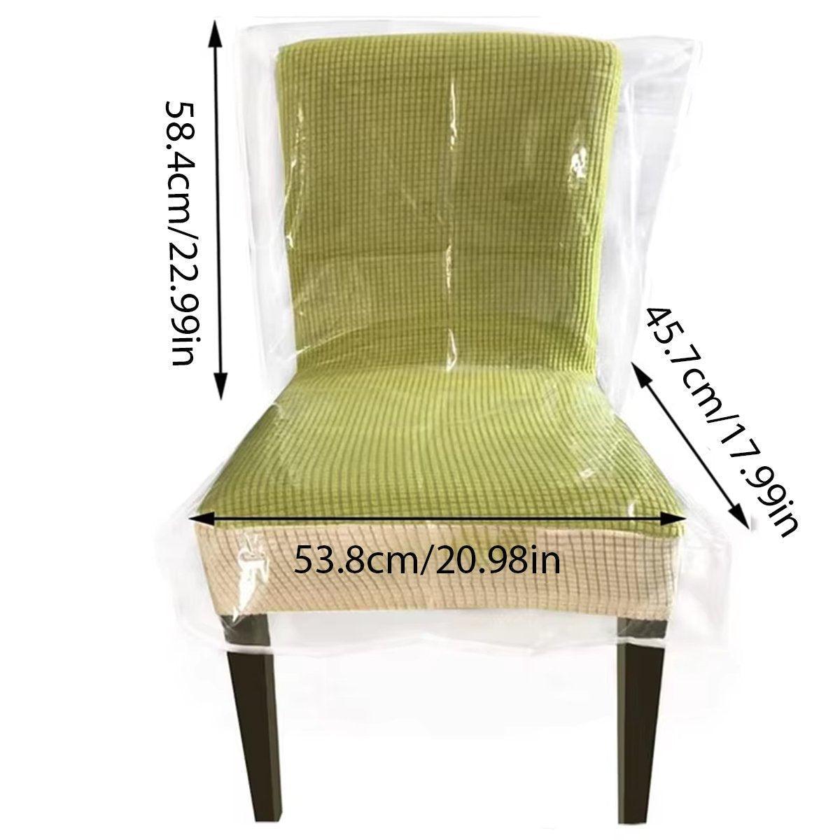 Green chair with a transparent cover showing dimensions on a white background