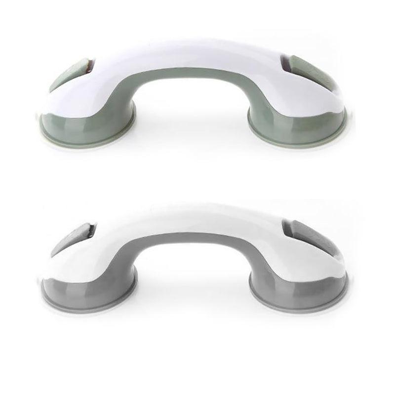 Two gray suction cup handles on a white background