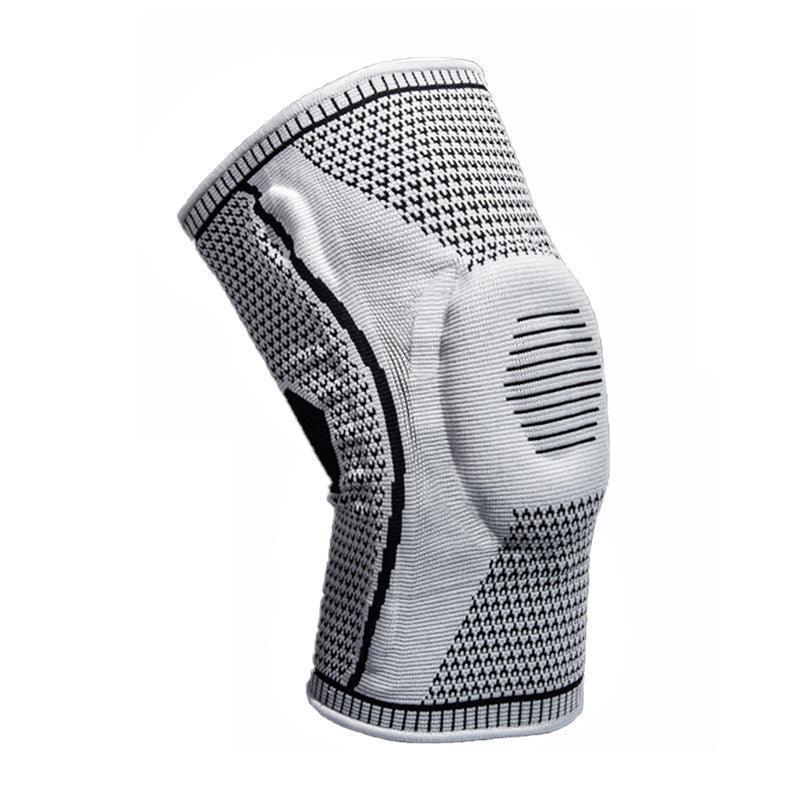 Gray and black knee brace on a white background