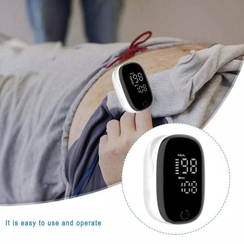 Digital thermometer held over a person's arm with close-up inset showing device details.