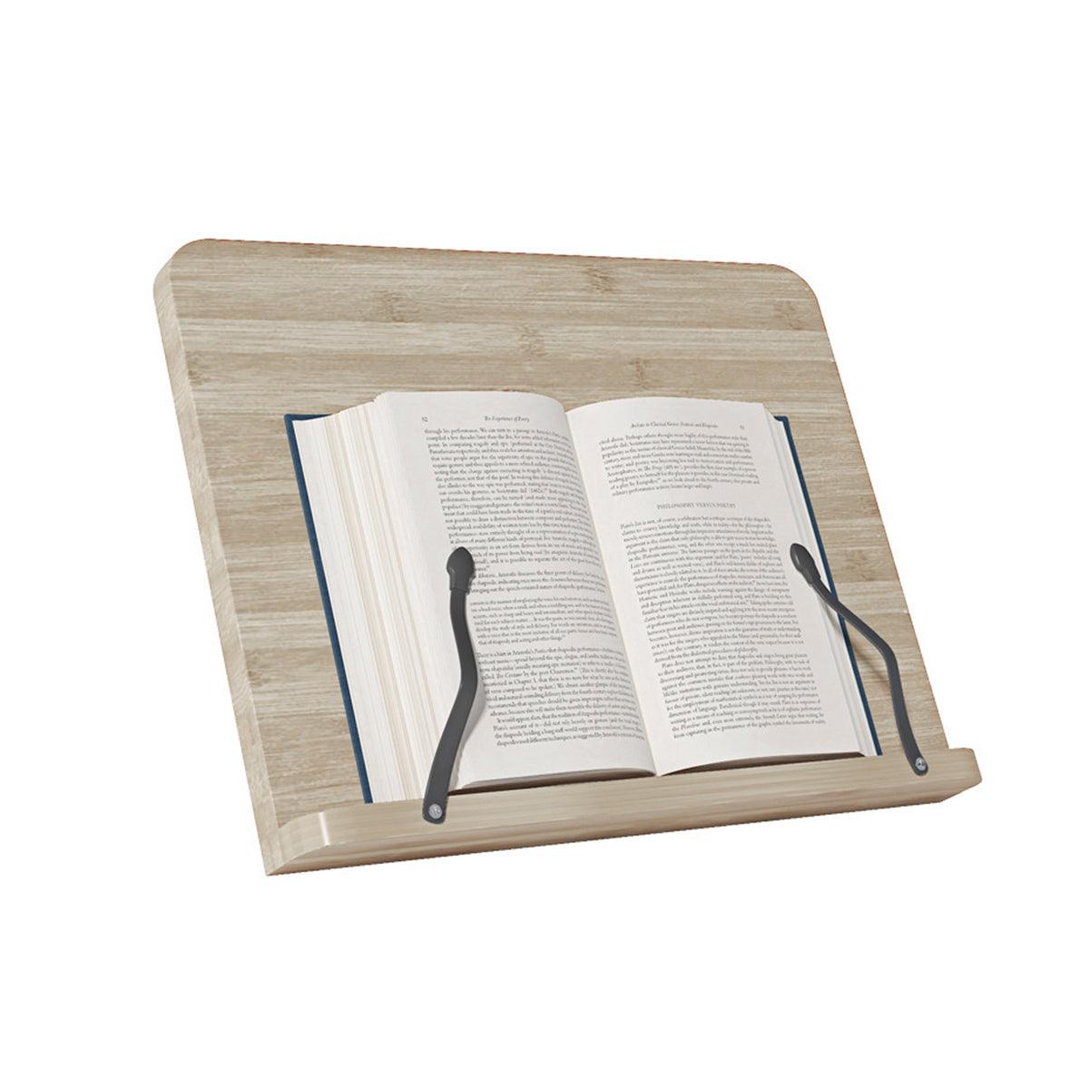 Wooden book stand with an open book on a white background