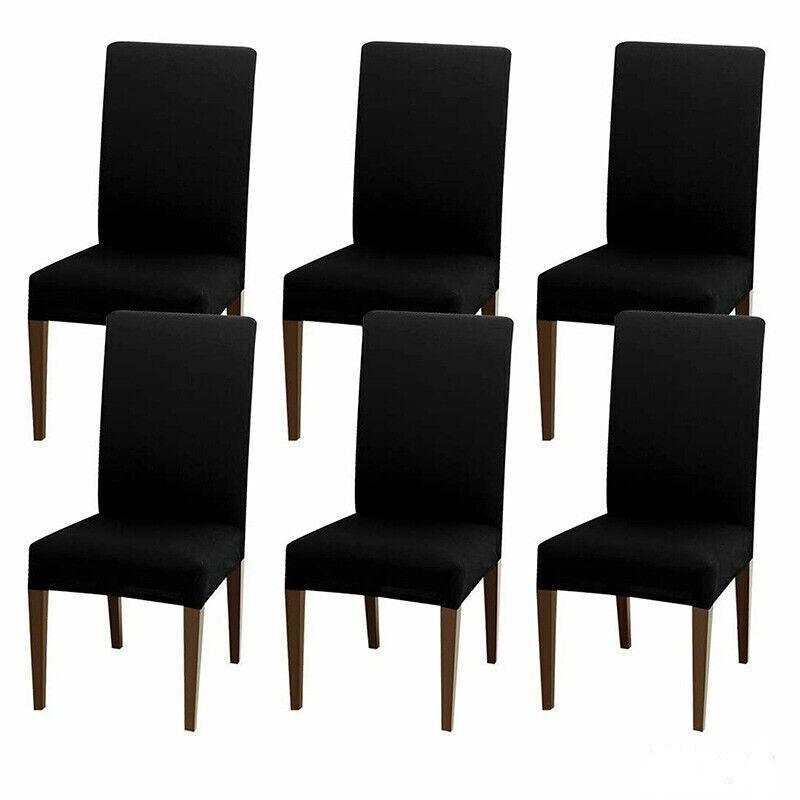 Set of six black chairs with wooden legs on a white background