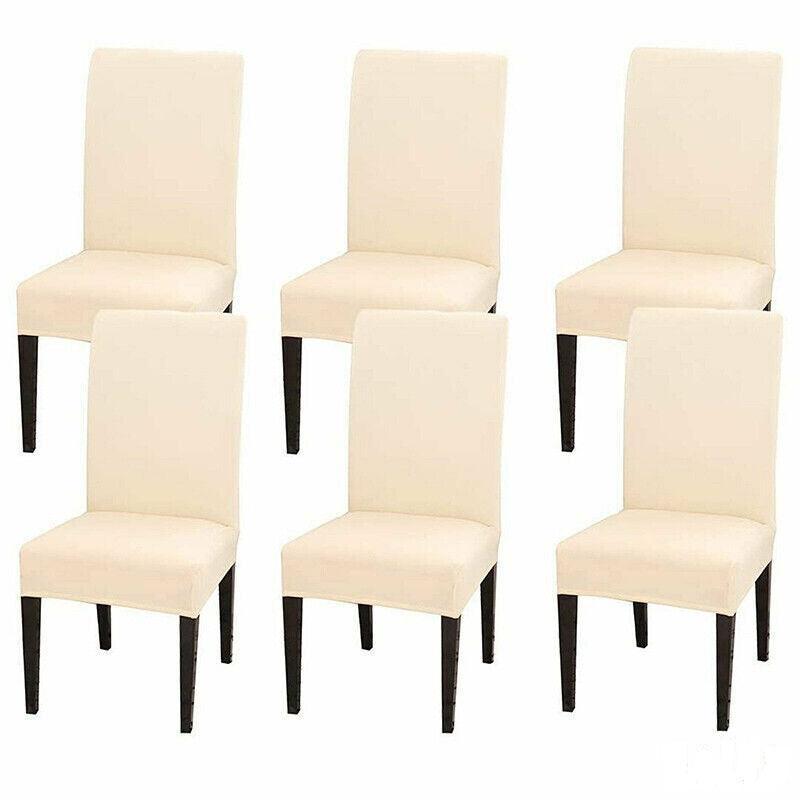Set of six beige dining chairs with black legs on a white background