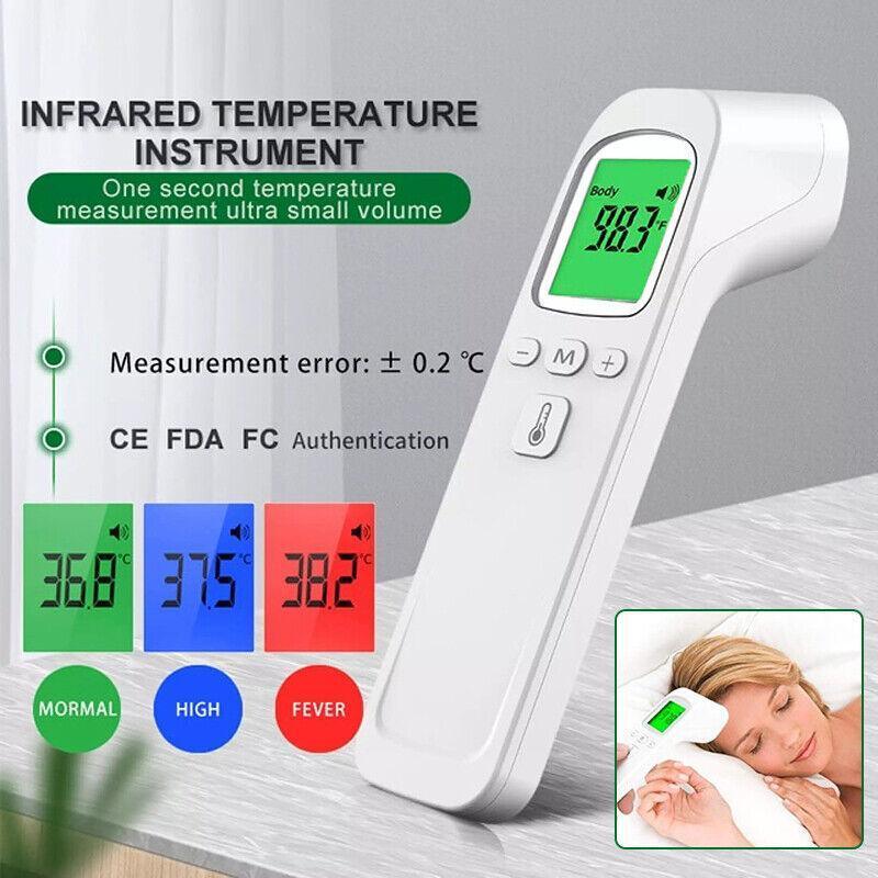 Infrared temperature instrument with digital display on a gray background