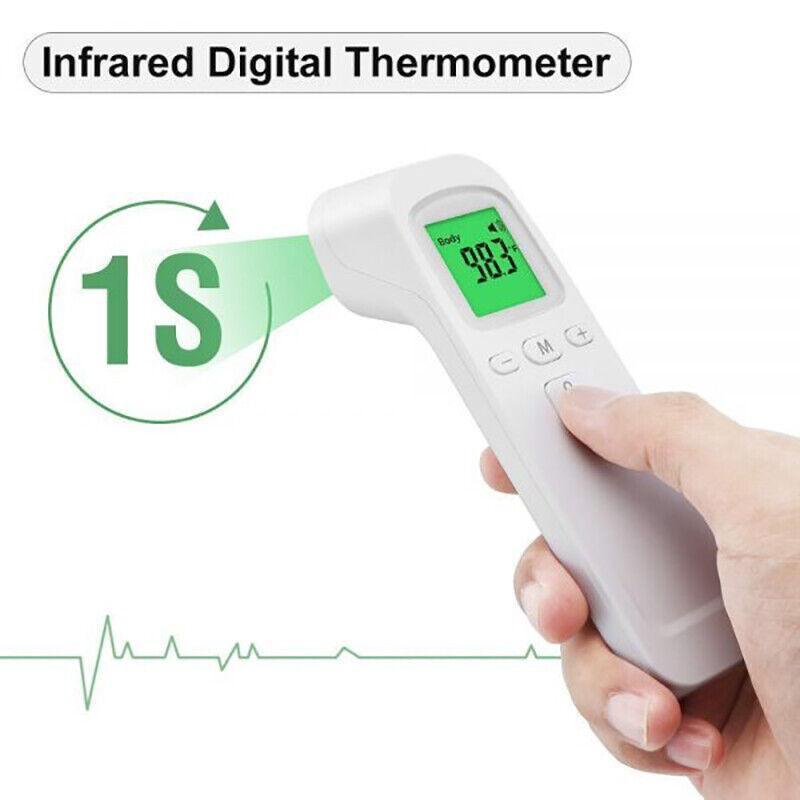 Infrared digital thermometer held by a hand with a white background