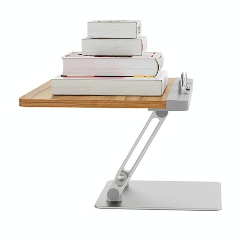 Wall-mounted desk with a wooden shelf holding books on a white background