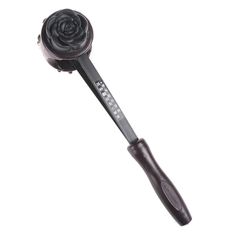 Decorative mallet with rose design on a white background
