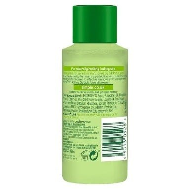 Green bottle with a label on a white background