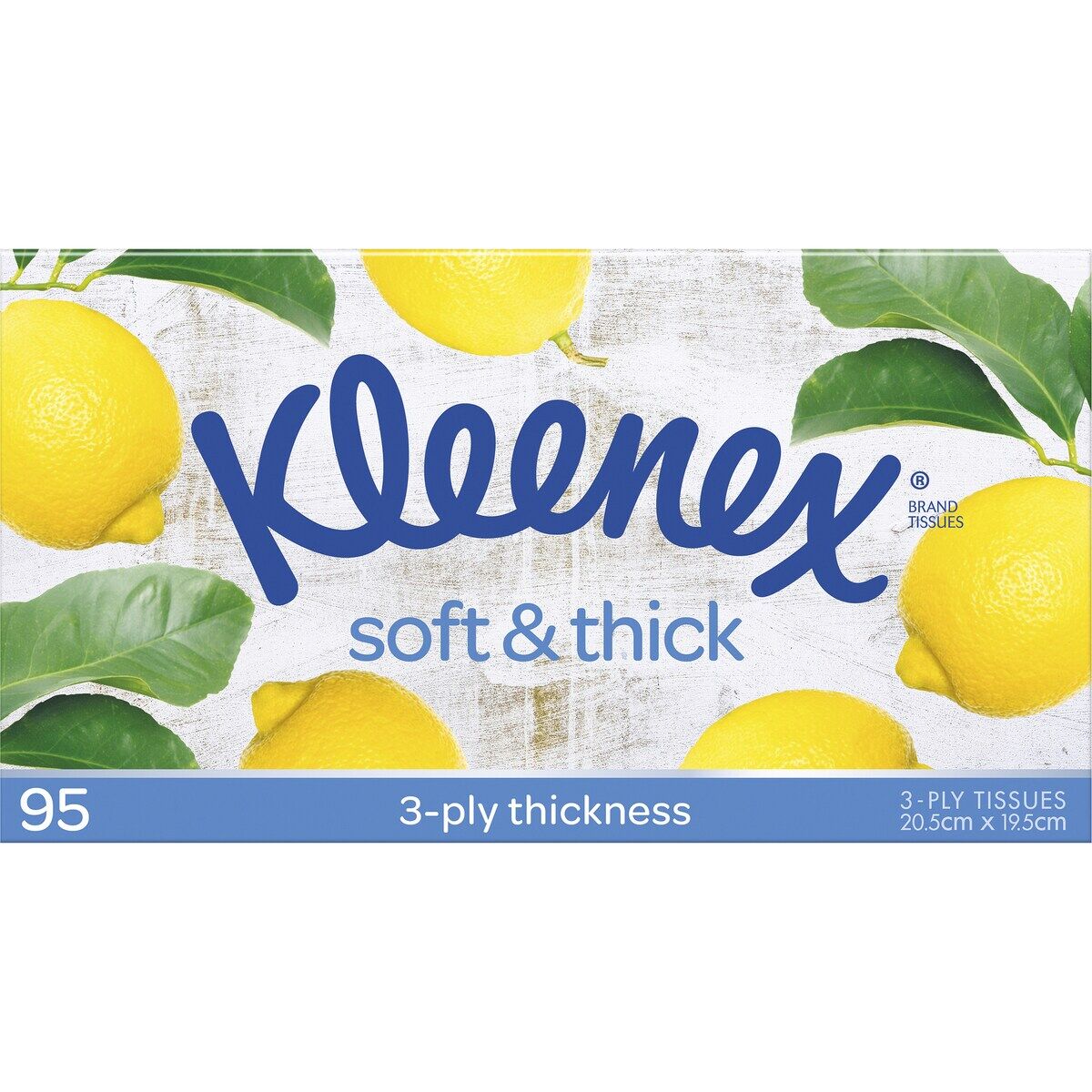 Kleenex tissue box with lemons and leaves on a white background