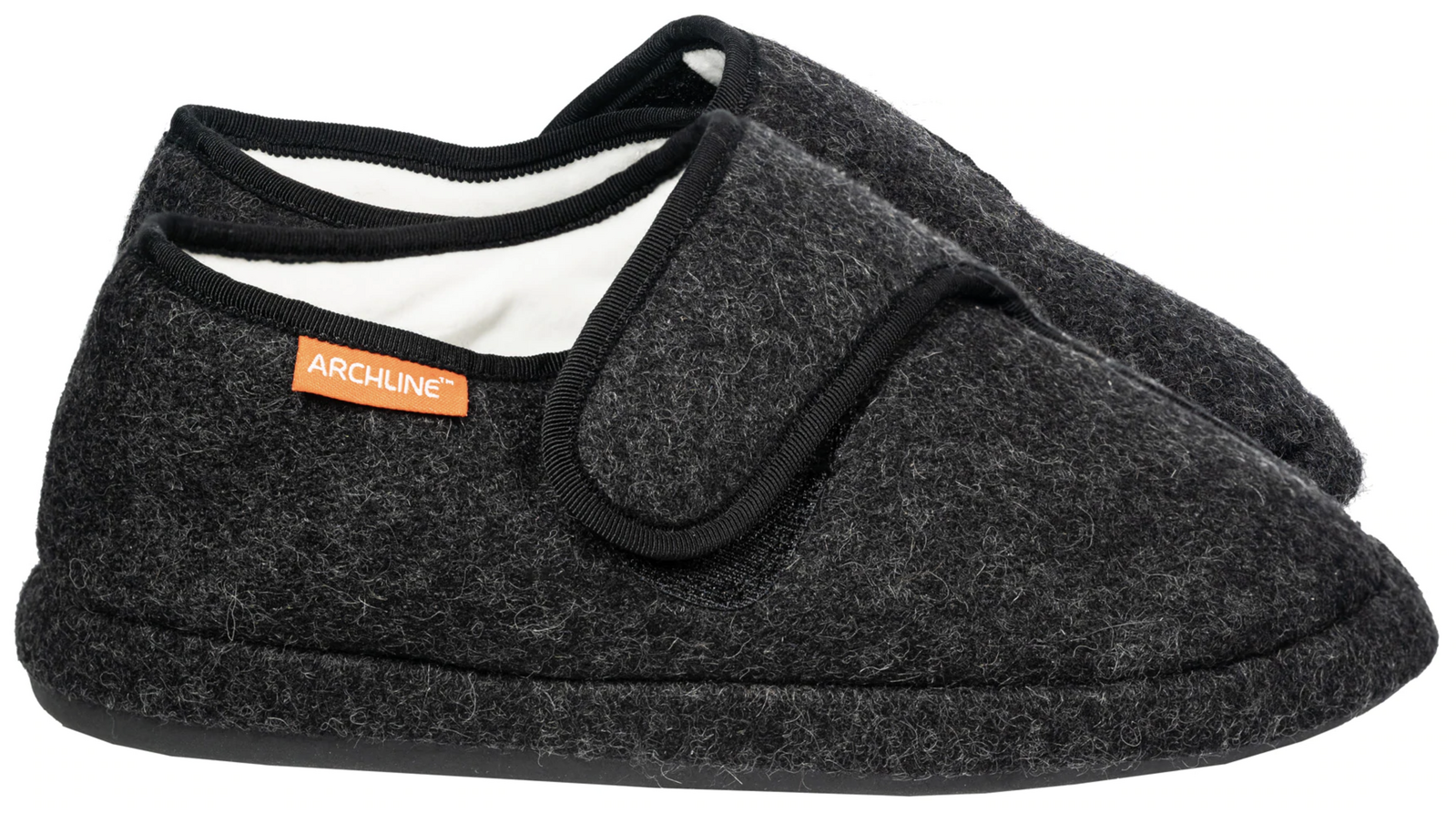 Pair of gray slippers with a visible brand label on a white background