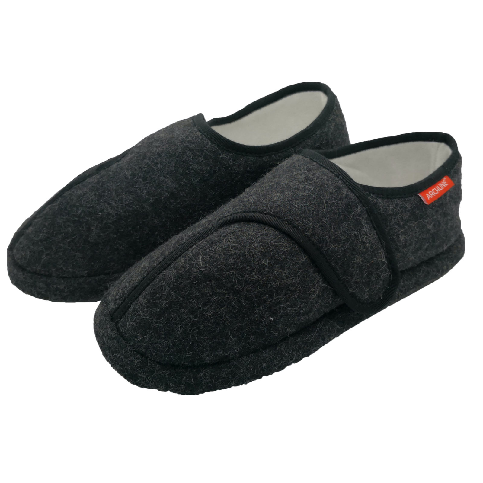 Pair of dark gray slippers with a red tag on a white background