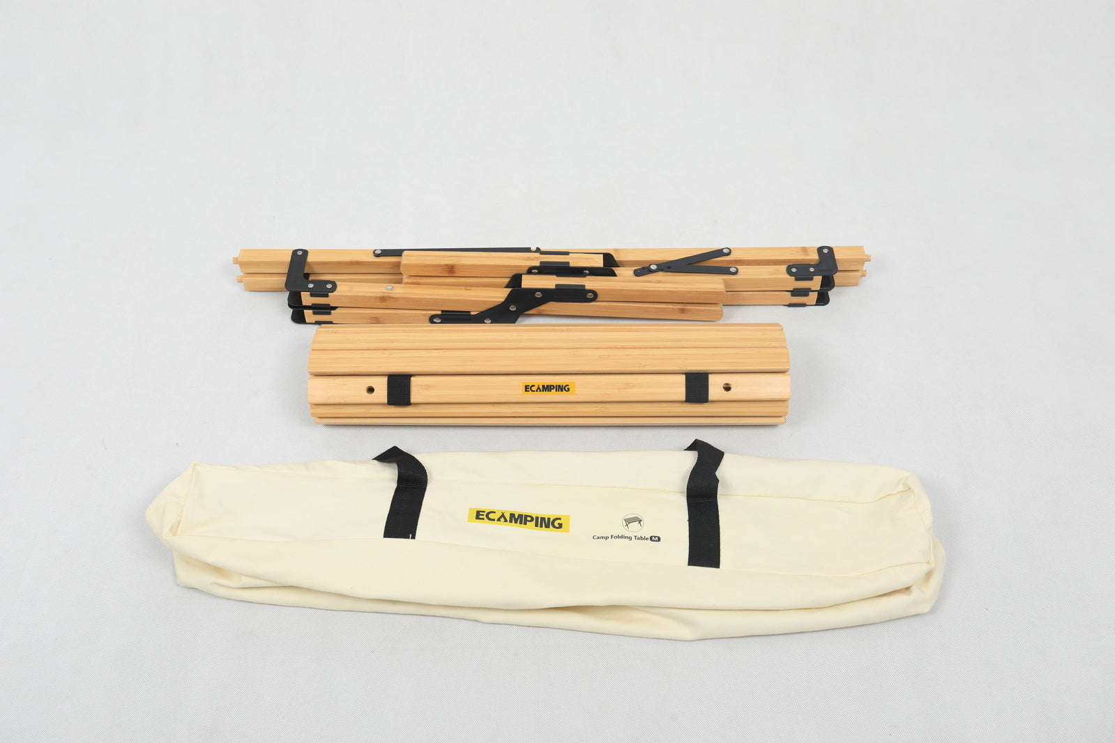 Wooden camping sticks with carrying case on a light gray background
