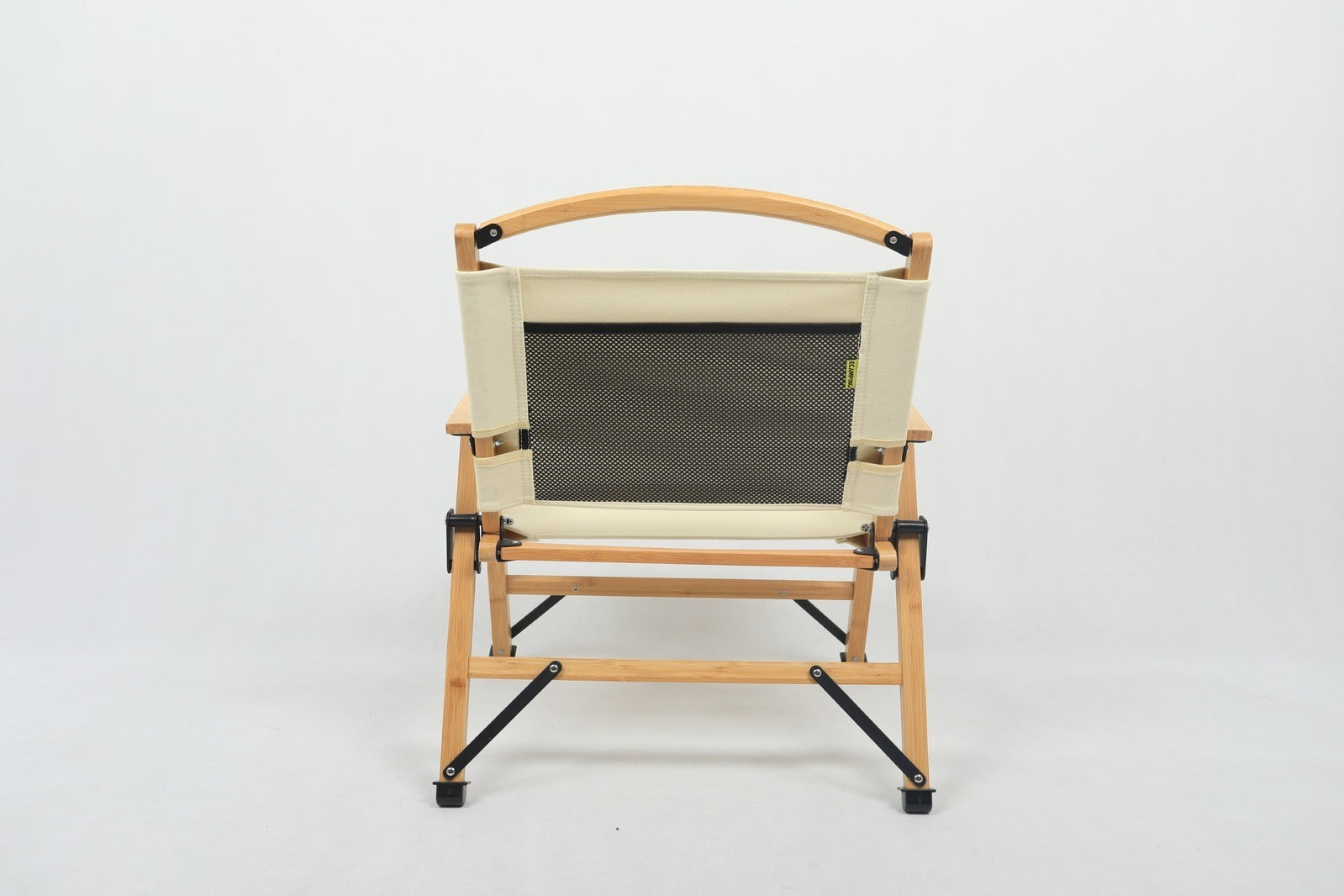 Foldable chair with beige seat and backrest on a white background