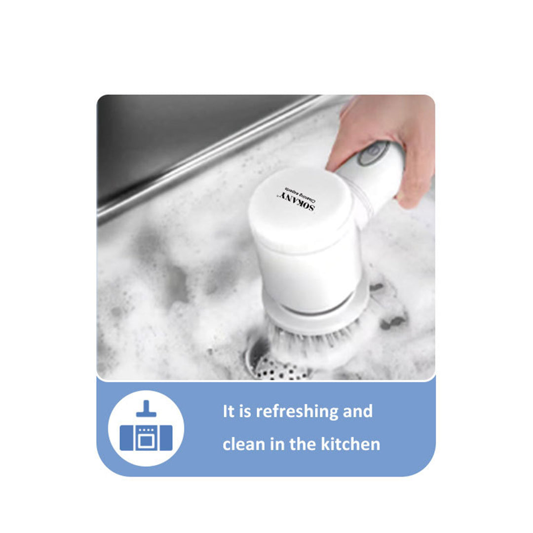 Hand using a white cleaning brush in a sink with text 'It is refreshing and clean in the kitchen'.