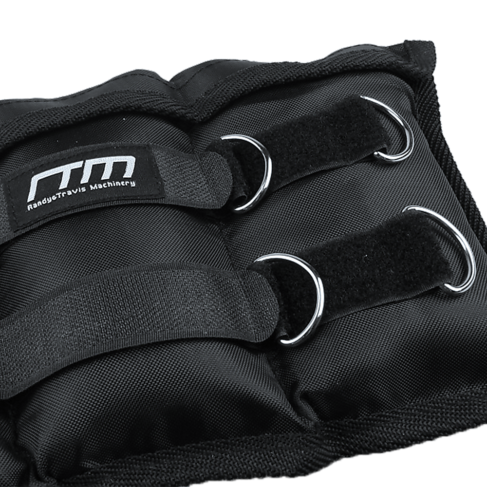 Black strap with metal hooks and RandyTravis Machinery logo on a white background