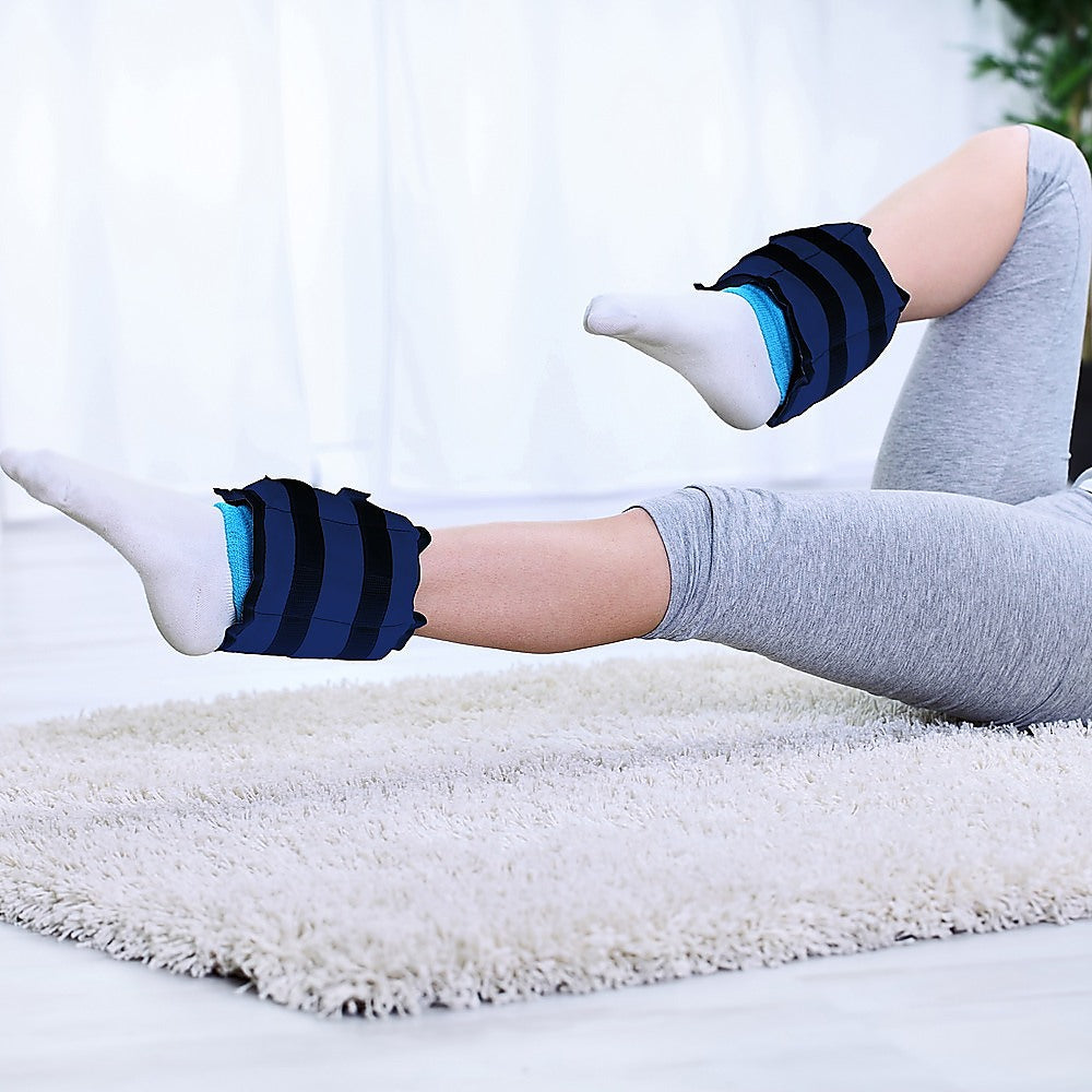 Person wearing blue striped socks on a white background