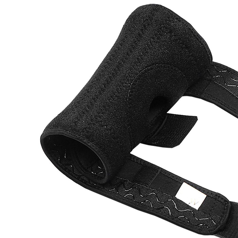 Black wrist support brace on a white background