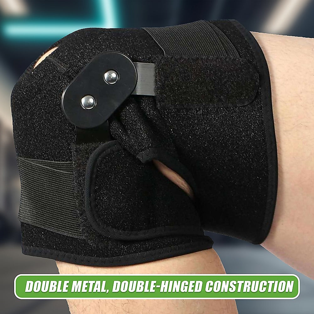 Black wrist support brace on a wrist with a blurred background