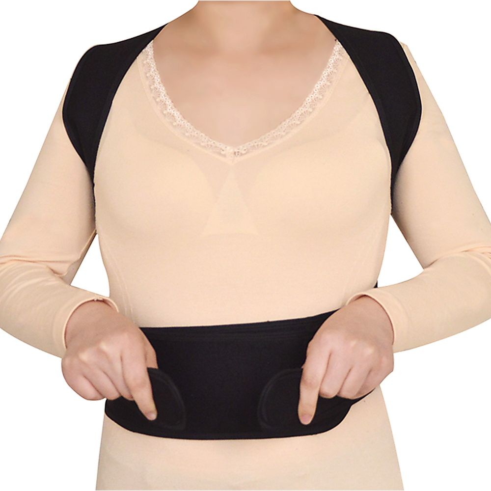 Person wearing a black posture corrector with a plain background