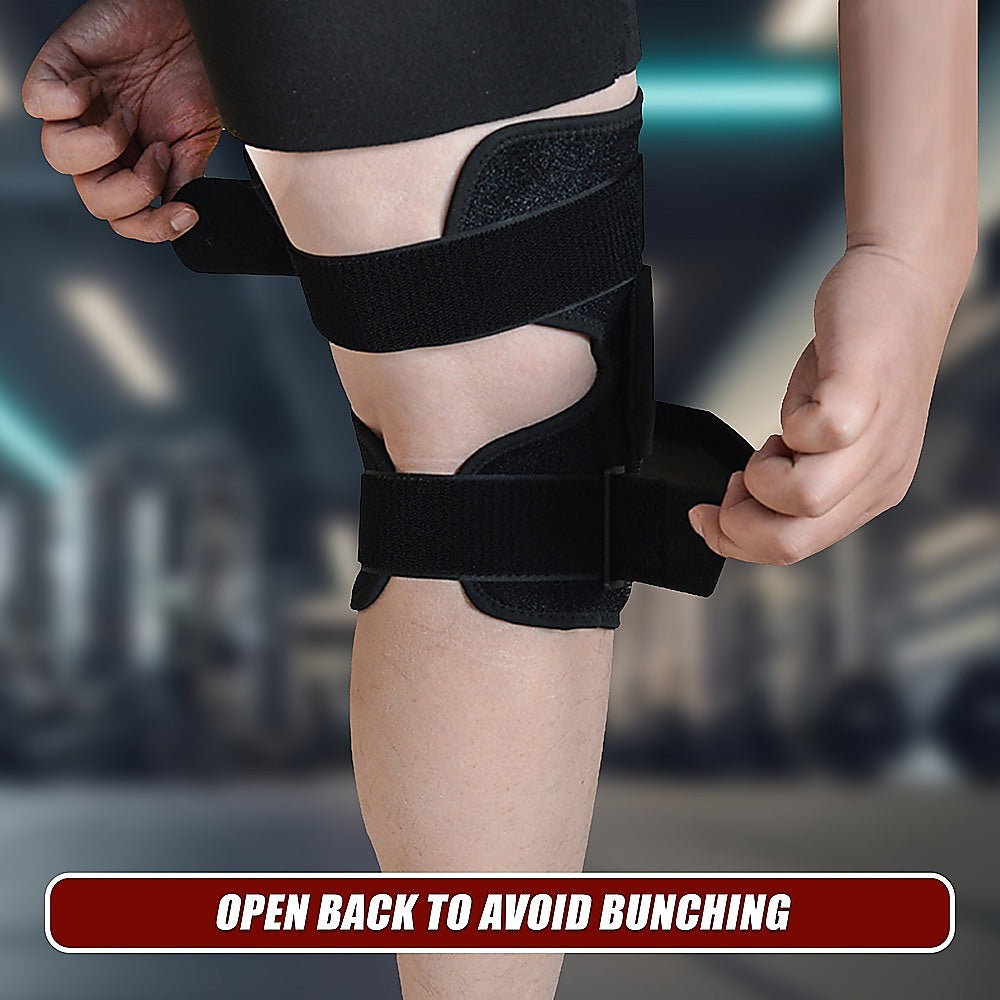 Person wearing a black knee brace with text 'Open back to avoid bunching' on a blurred background