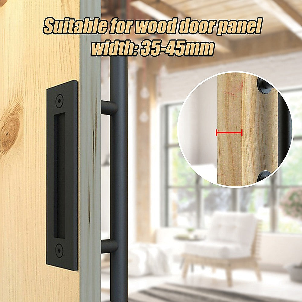 Black door handle on a wooden door with text indicating suitable width for wood panel.
