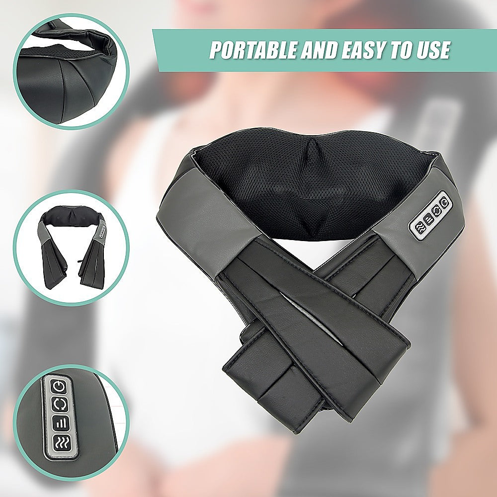 Black neck massager with control panel on a blurred background
