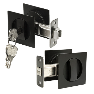 Black door lock mechanism with keys on a white background