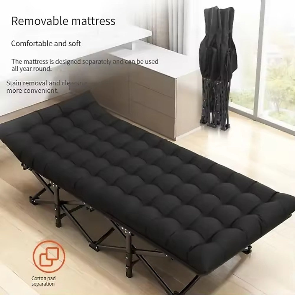 Black folding bed with removable mattress in a room setting