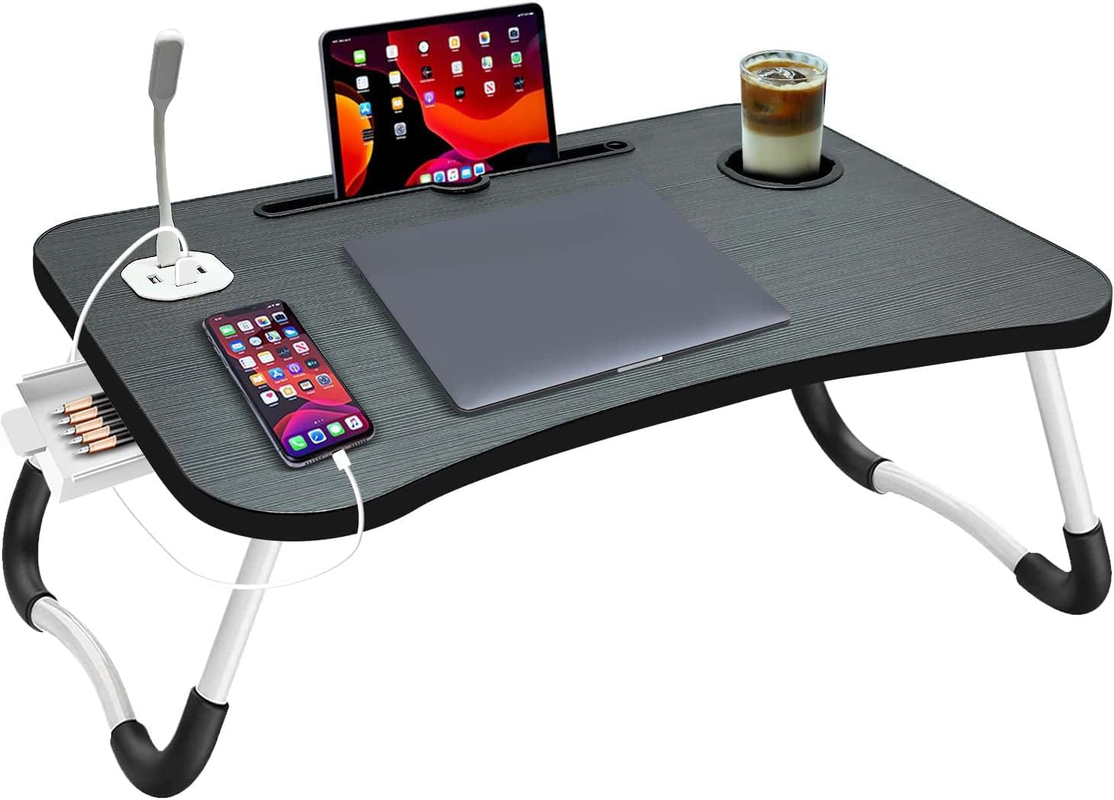 Foldable laptop desk with tablet, phone, and cup on a white background