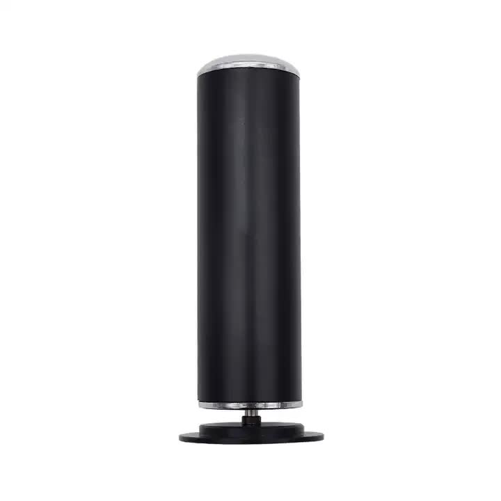 Black cylindrical object with a silver top on a white background