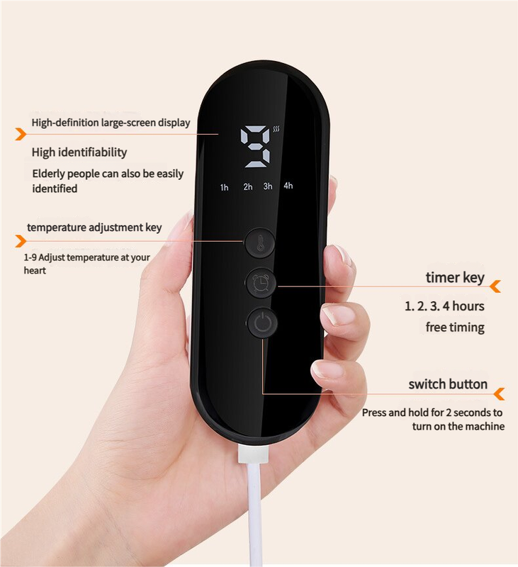 Hand holding a black electronic device with digital display and text labels on a beige background