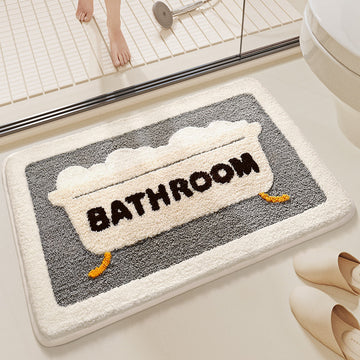 Bath mat with 'Bathroom' text on a bathroom floor