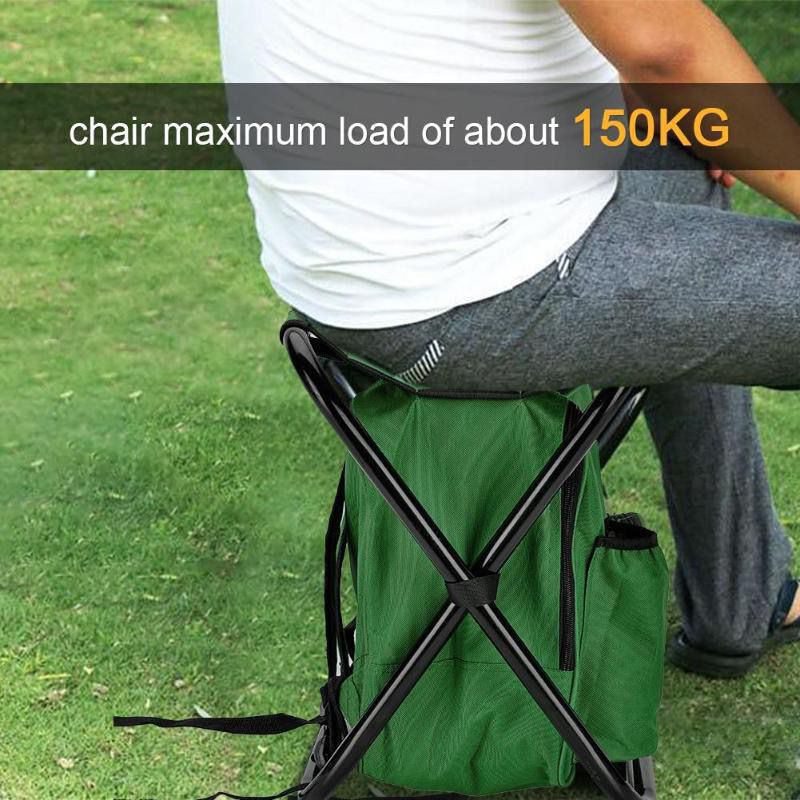 Person sitting on a green folding chair with a maximum load capacity of 150KG displayed.