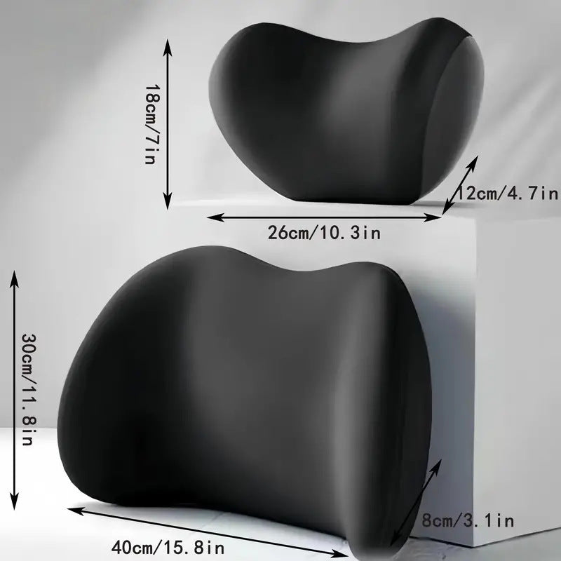 Black ergonomic chair pillow with measurements on a gray background