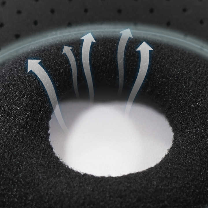Close-up of a black foam ring with white center and arrows indicating airflow.
