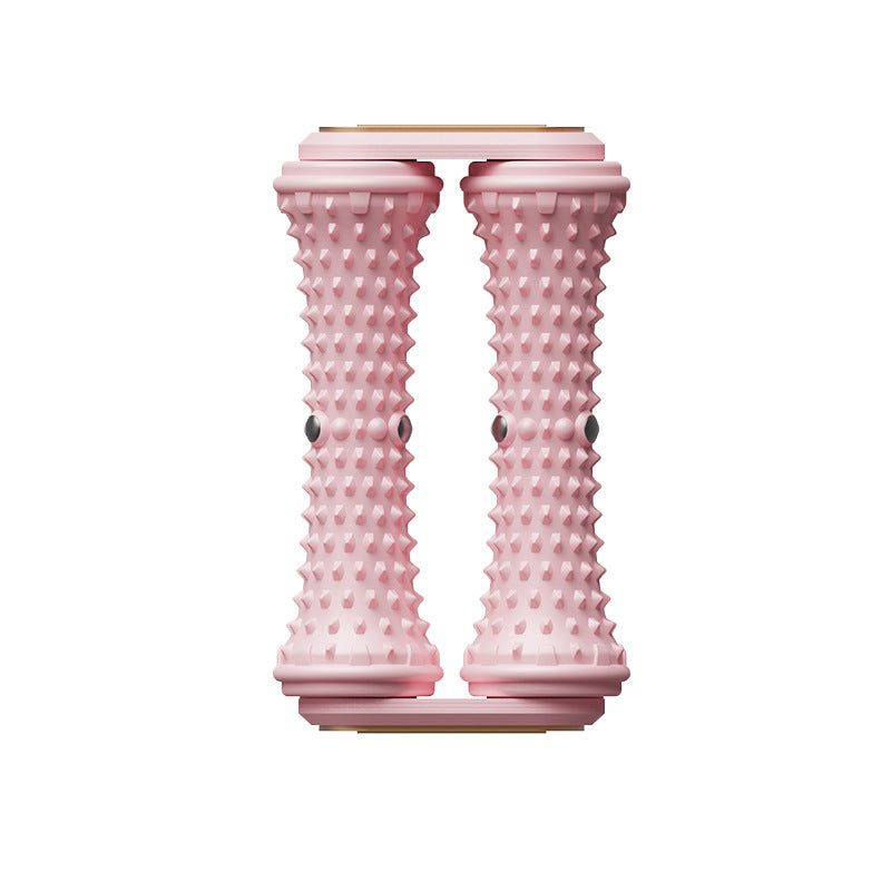 Pink textured roller massager on a white background