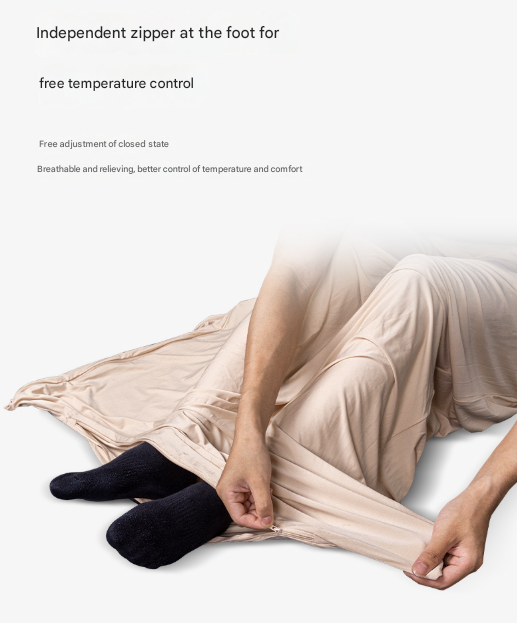 Person wearing black socks and beige pants with text about temperature control and comfort.