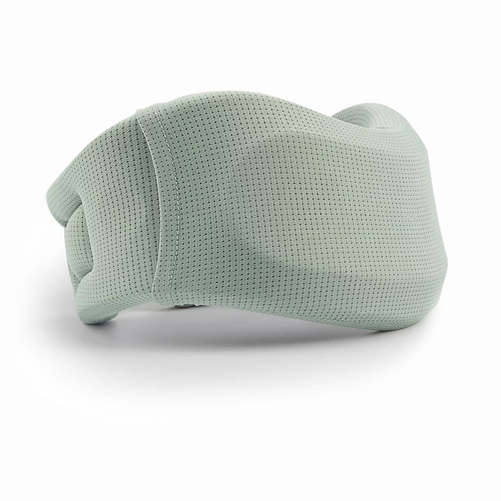 Light green textured pillow on a white background