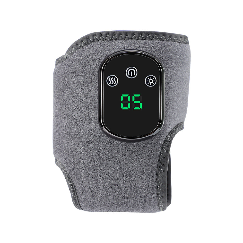Gray heating pad with digital display on a white background