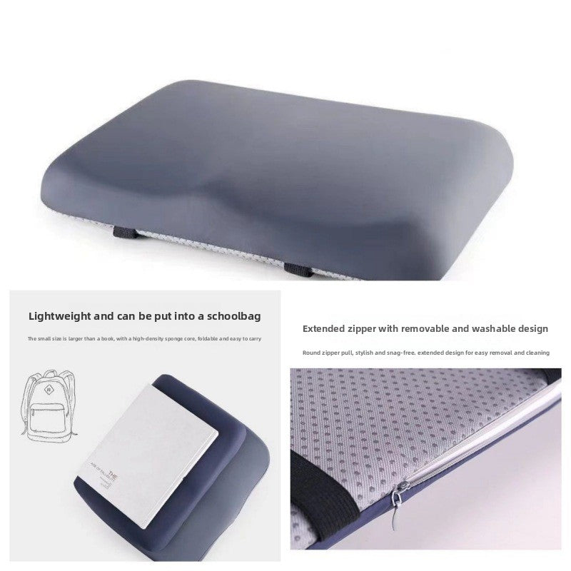 Gray cushion with extended zipper on a white background