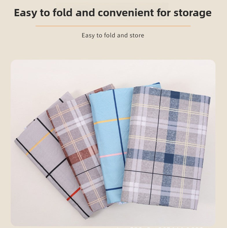 Set of plaid towels in various colors on a light background with text about ease of folding and storage.