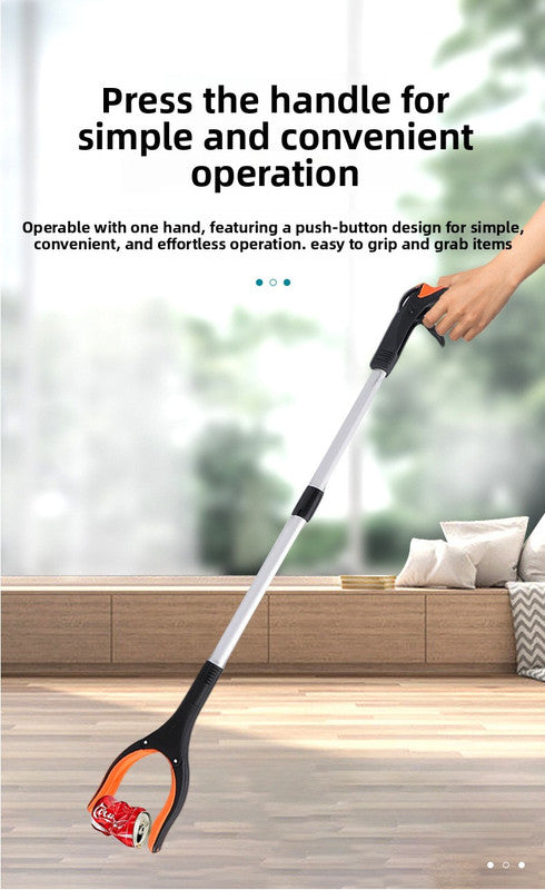 Handheld cleaning tool with handle and blade, held by a hand in a living room setting.