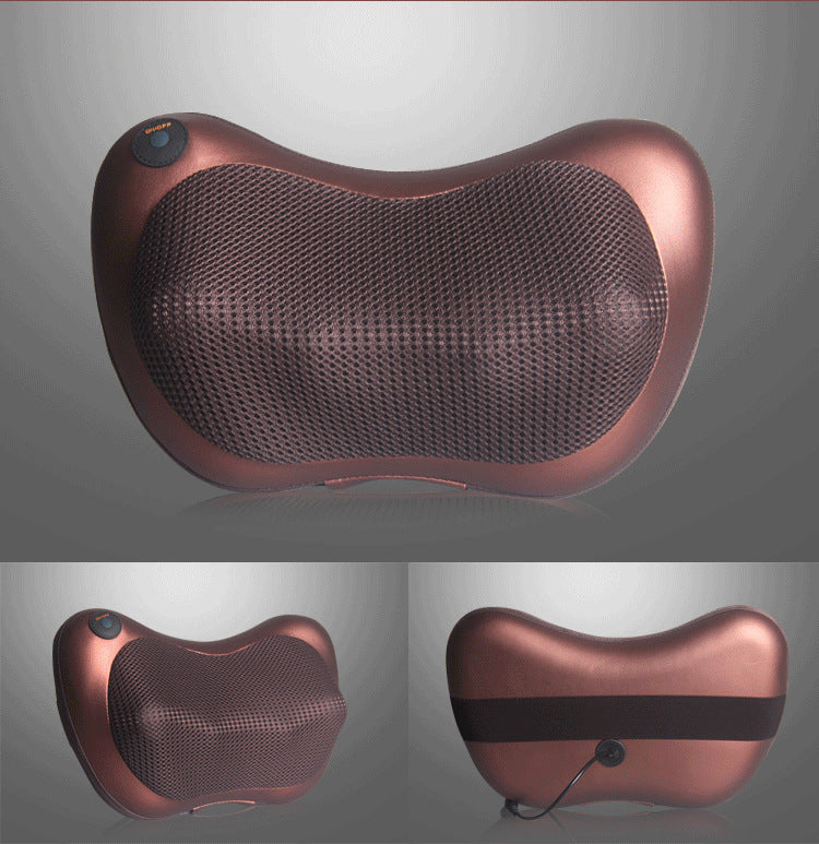 Rose gold massage pillow with black mesh on a gray background