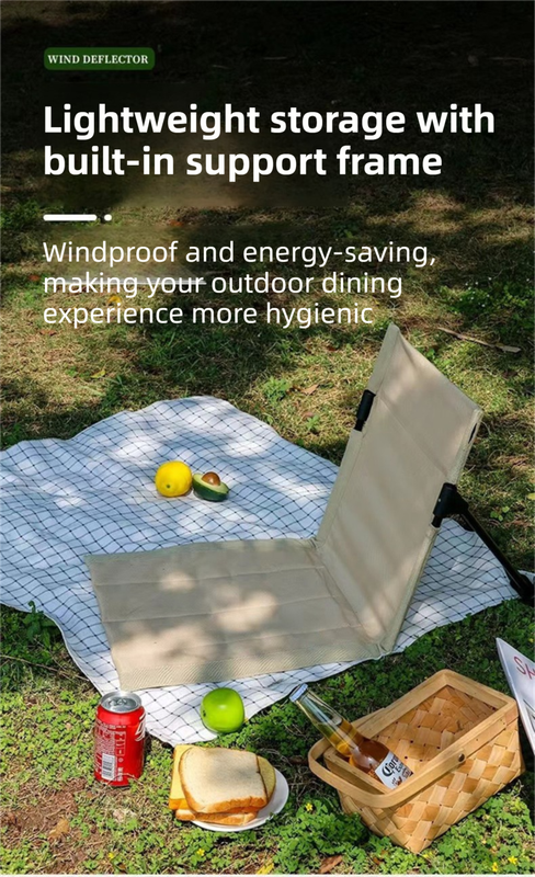 Outdoor setting with a portable chair, food items, and a blanket on grass, featuring text about lightweight storage and support frame.