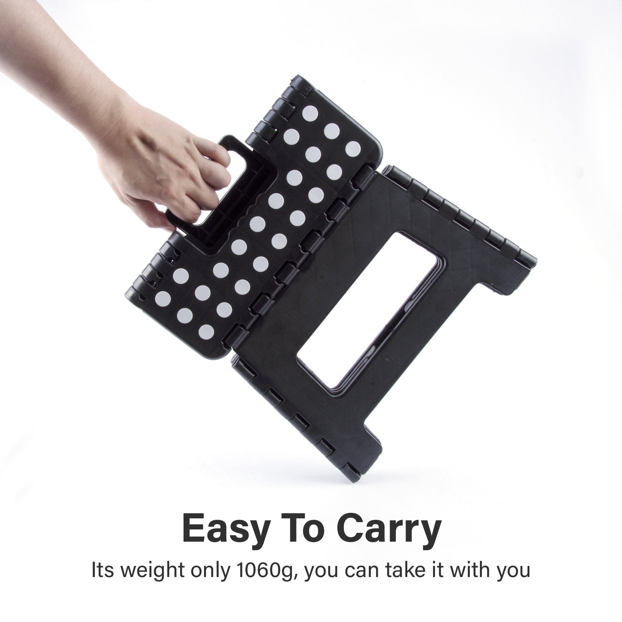 Black and white polka dot folding stool being held by a hand on a white background with text about weight.