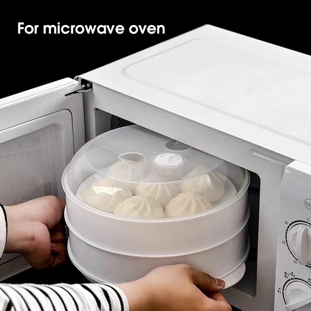Steamer with buns being placed into a microwave oven