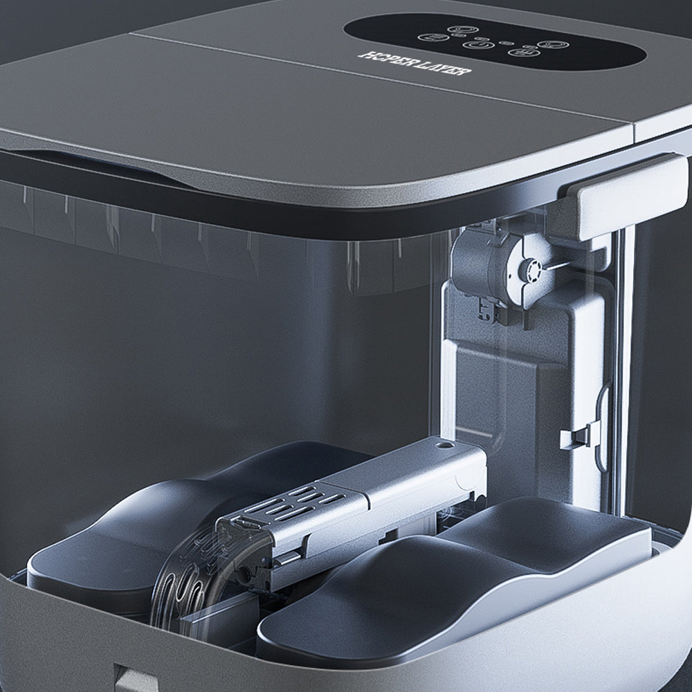 Close-up of a kitchen appliance with a visible brand logo on a dark background