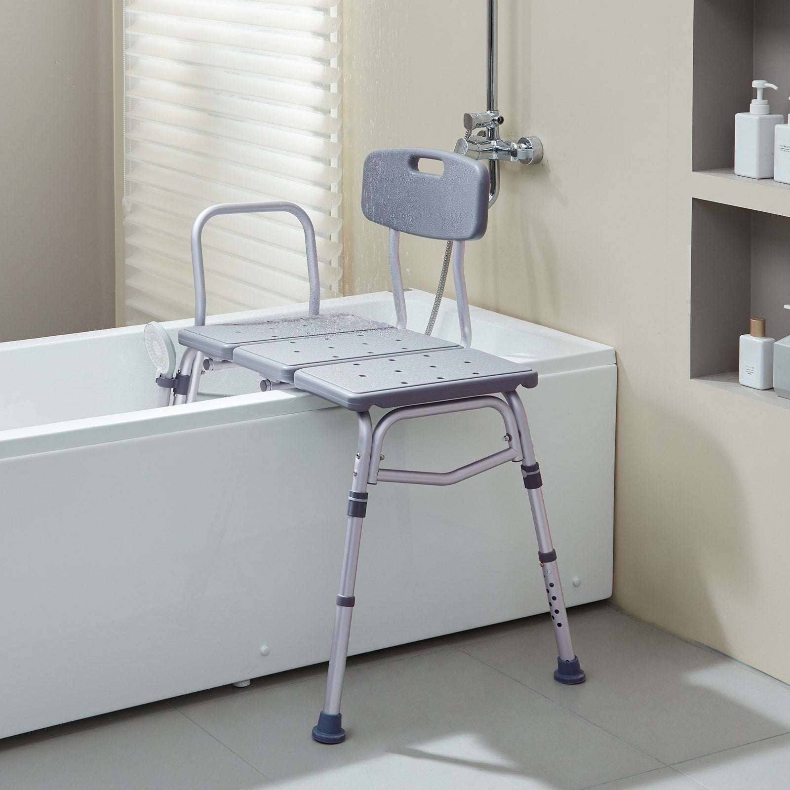 Bath transfer bench in a bathroom setting with a bathtub.